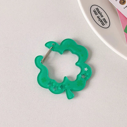 Translucent green resin clover clip with star cutouts and metal clasp for bags creative bag phone pendant backpack charm