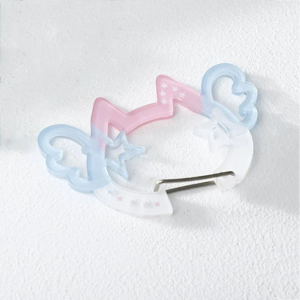 Pastel pink and light blue translucent acrylic unicorn hair clip with star detail for bags creative bag or phone pendant backpack