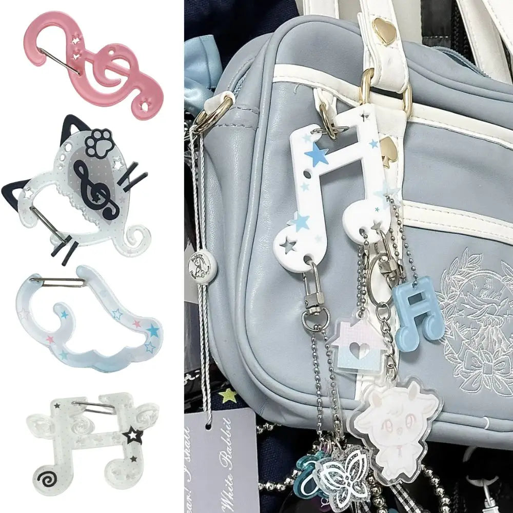 White translucent resin music note keychain with blue star accents and silver hardware for bags creative bag use