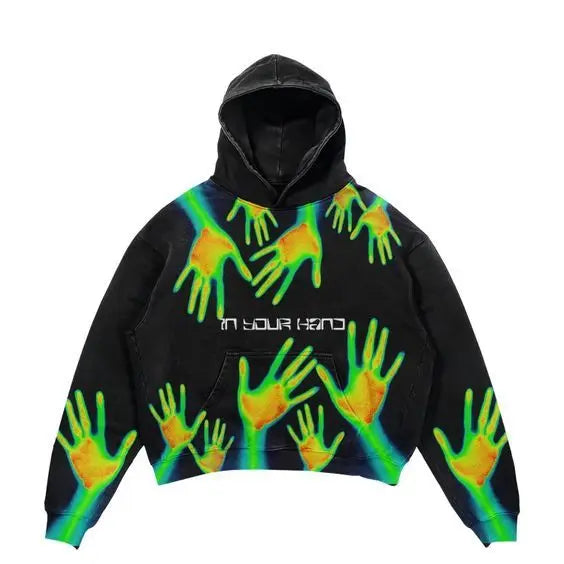 Black hoodie with vibrant thermal print of glowing green and orange hands in hip hop y2k korean harajuku fashion style