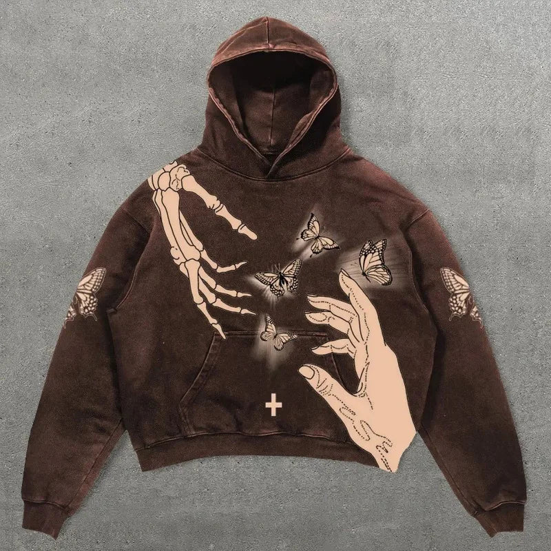 Brown hoodie with cream ink graphic of skeletal and flesh toned hands and butterflies in hip hop y2k style american style sweatshirts and korean harajuku fashion