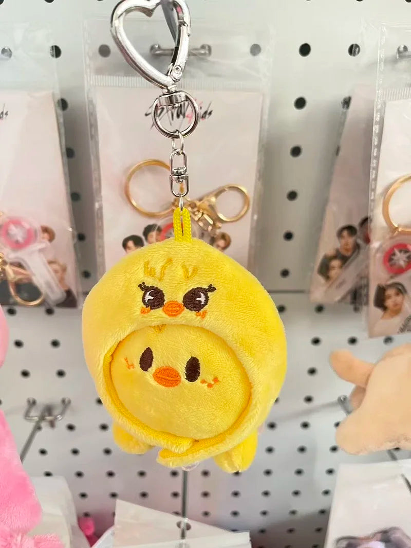 Yellow plush chick skzoo plush keychain with embroidered details and heart clip toy fan gift magic academy cloak accessory