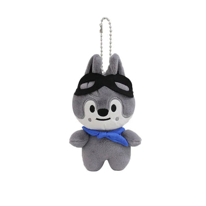 Gray skzoo plush keychain of cartoon wolf with black goggles and blue scarf magic academy cloak toy fan gift