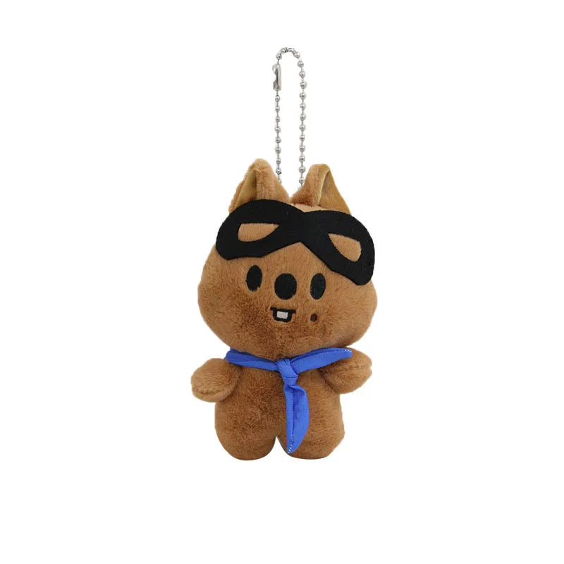 Brown plush skzoo plush keychain featuring a cartoon dog with black eye mask and blue magic academy cloak scarf toy fan gift