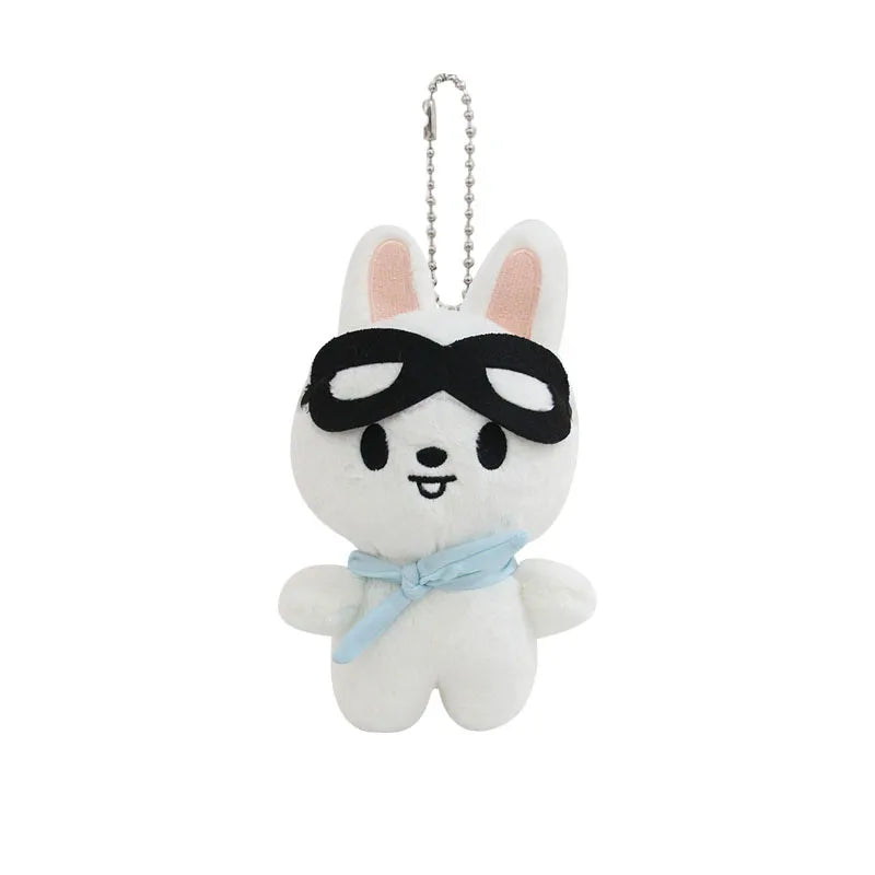 White plush bunny skzoo plush keychain wearing black aviator sunglasses and light blue magic academy cloak scarf toy fan gift