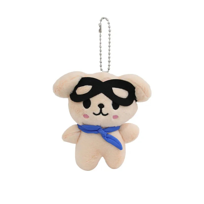 Cream-colored skzoo plush keychain bear with black goggles and blue magic academy cloak scarf, ideal toy fan gift