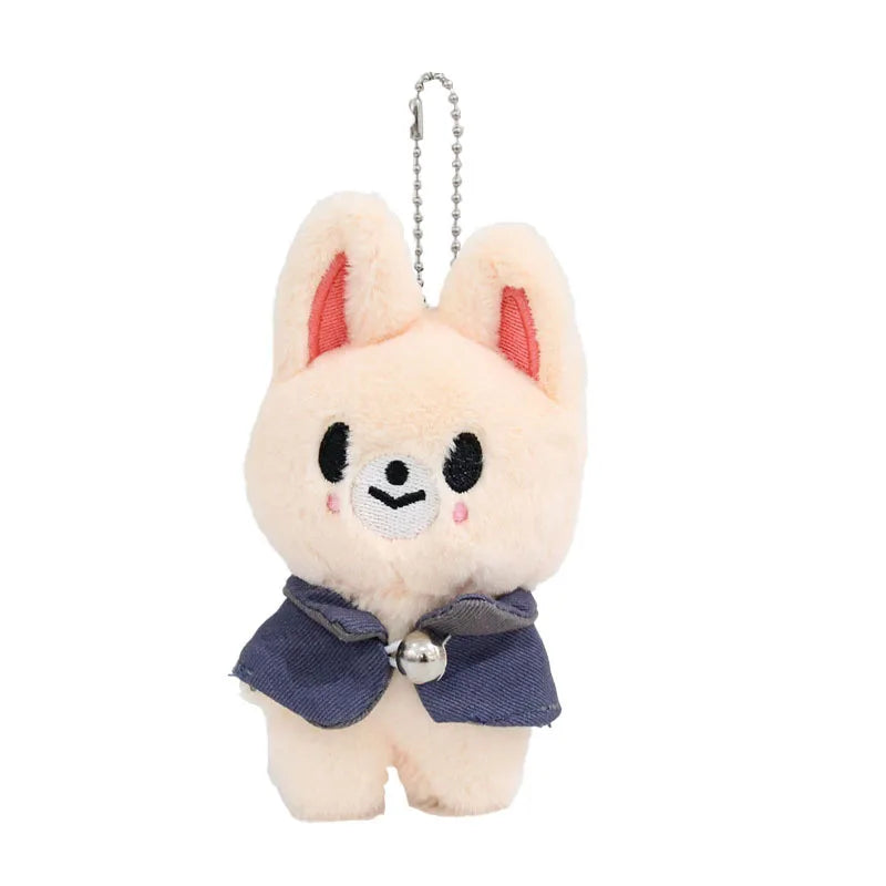 Cream-colored plush skzoo plush keychain with magic academy cloak and silver bell toy fan gift accessory