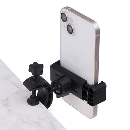 Black plastic phone clamp holding silver iphone on 360 degree rotating universal microphone supporting stand
