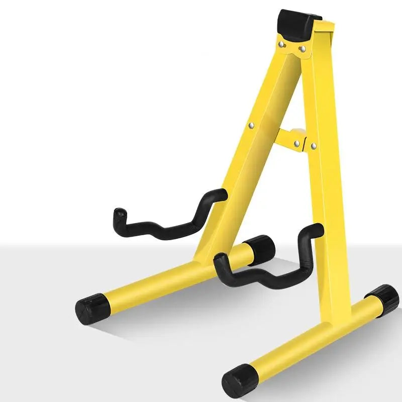 Yellow metal universal electric guitar stand with black rubberized grips and feet for vertical electric bass guitar display