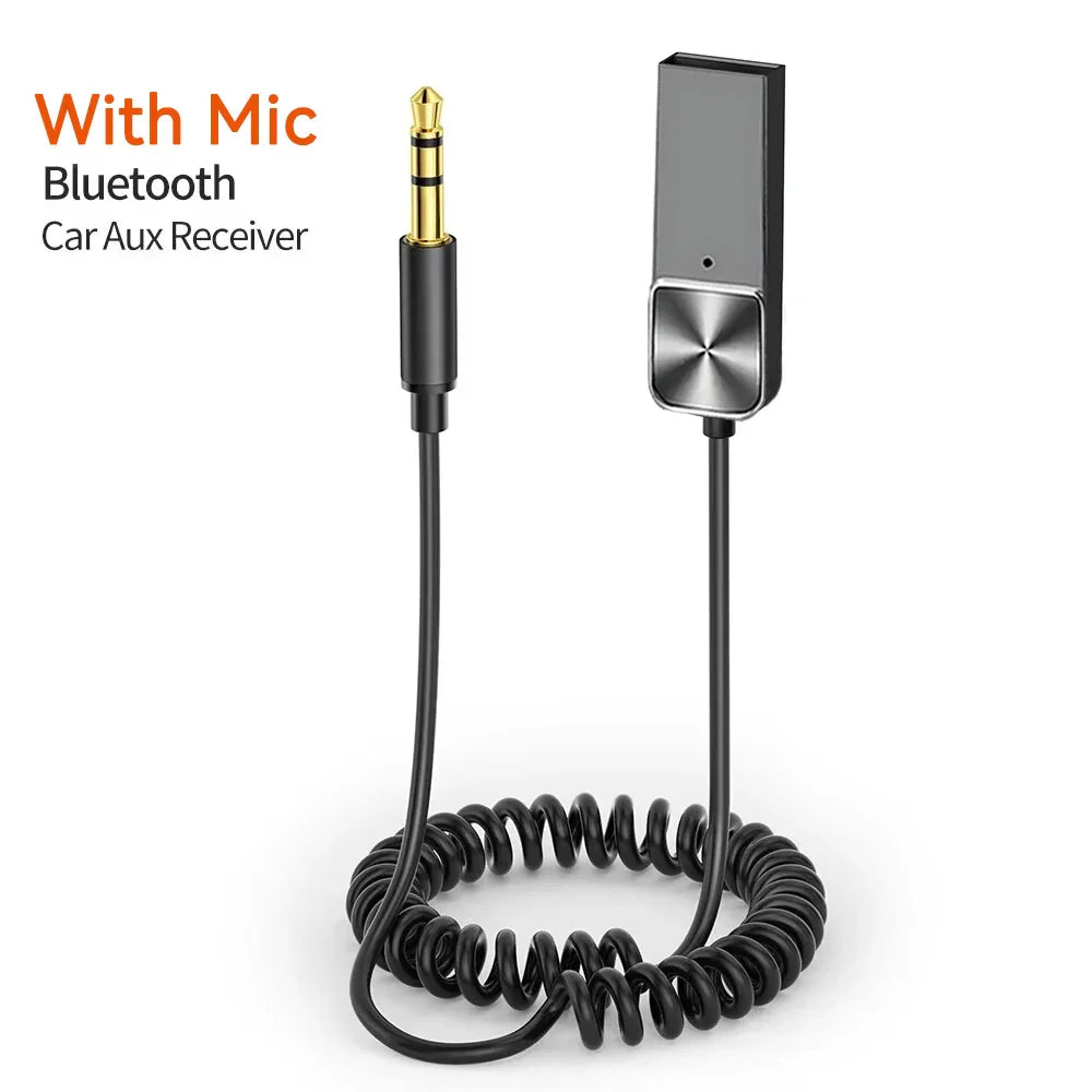 Black coiled bluetooth car aux adapter with gold 3.5mm jack and silver button panel audio receiver dongle handsfree