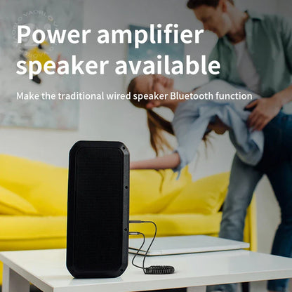 Black rectangular portable bluetooth audio receiver dongle with textured grille and coiled cable for car bt transmit use