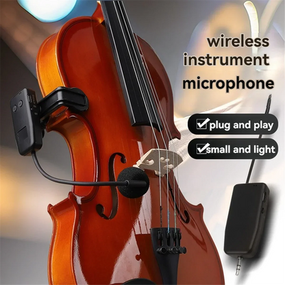 Black wireless violin microphone with foam windscreen clipped to instrument for stage performance audio receiver use