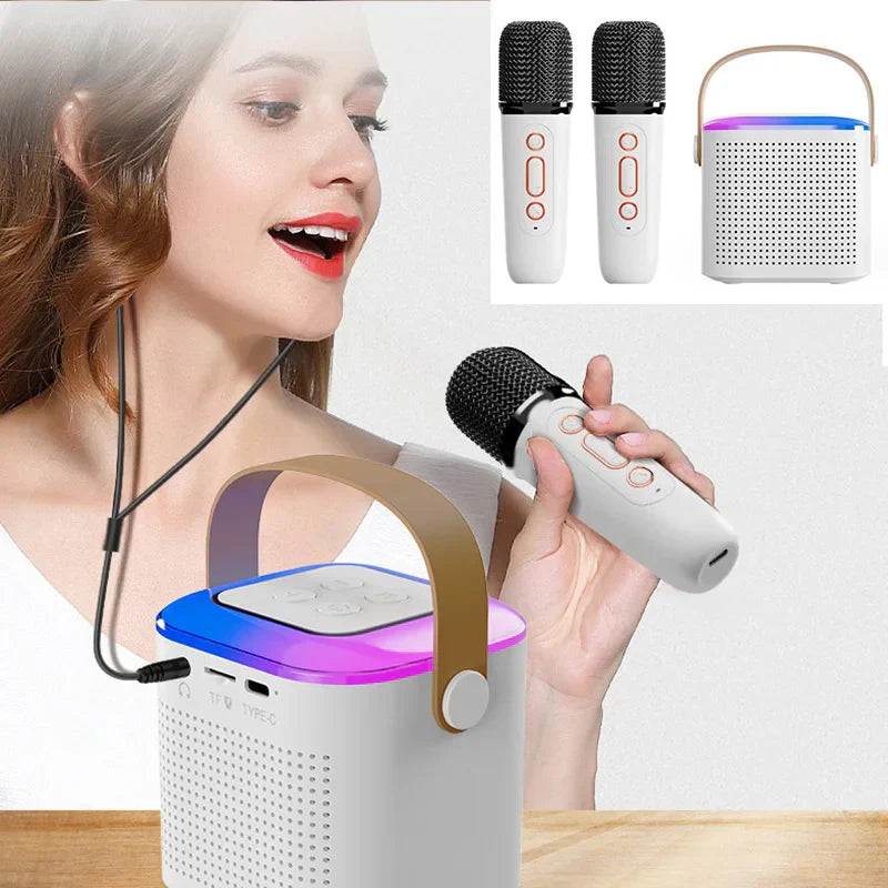 White portable karaoke machine with handle and colorful led lighting featuring two wireless microphones for home use