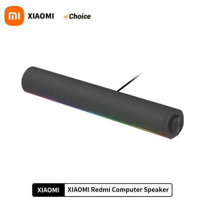 Black cylindrical xiaomi redmi computer speaker with matte finish and rgb lighting delivers immersive sound effects and sky sound field