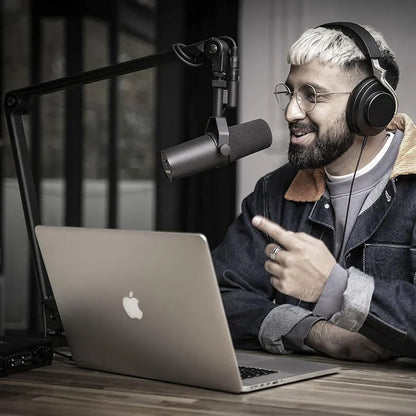 Black over-ear headphones with matte finish and silver accents in the newest manufacturer SM7B microphone kit for recording