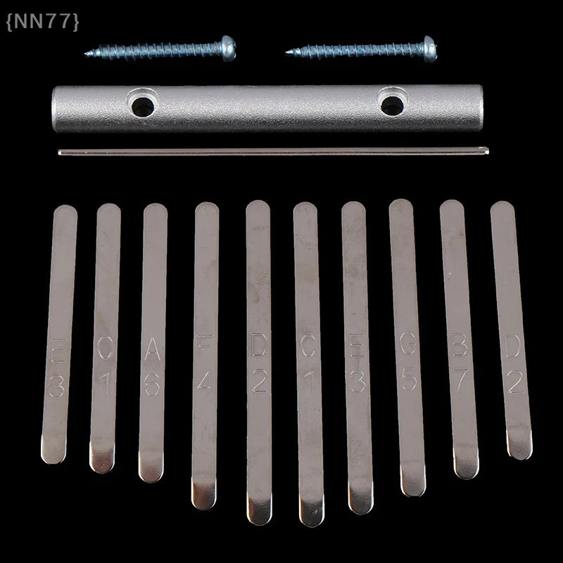 Set of ten silver-toned metal thumb piano bridge components with engraved markings and screws for keys replacement kalimba