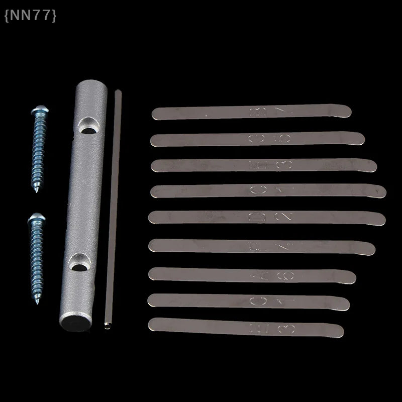 Set of ten silver-toned metal keys replacement kalimba with engraved thumb piano bridge and mounting bar screws for repair