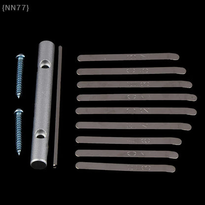 Set of ten silver-toned metal keys replacement kalimba with engraved thumb piano bridge and mounting bar screws for repair