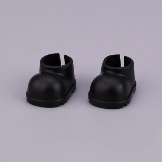 A pair of black plastic doll boots with rounded toe and open back for labubu clothes gifts black suit fashion