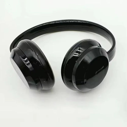 Black over-ear headphones with glossy finish and rounded earcups complement cute plush doll black suit fashion labubu clothes gifts