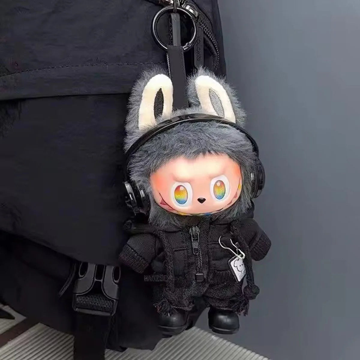 Black plush bunny keychain with rainbow eyes wearing a tactical jacket designed as cute plush doll black suit fashion labubu clothes gifts