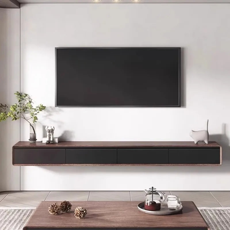 Black flat-screen television mounted on white wall above minimalist glamour tv stand with drawers storage meuble