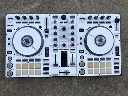 White pioneer ddj-sr dj controller with black knobs fully surrounded by protective stickers from beat music store
