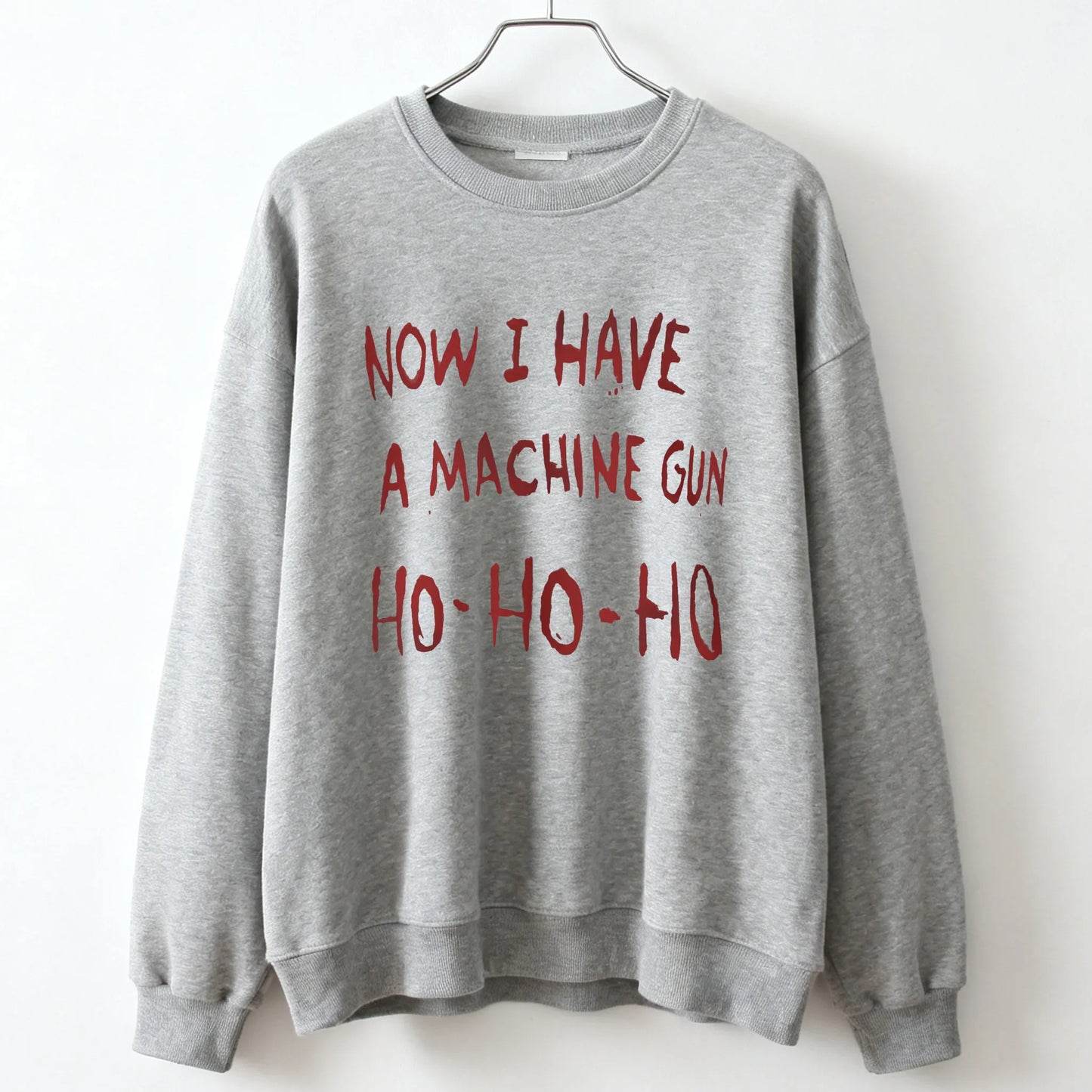 Gray unisex sweatshirt with red now i have a machine gun ho-ho-ho text referencing die hard mclane naktomi plaza