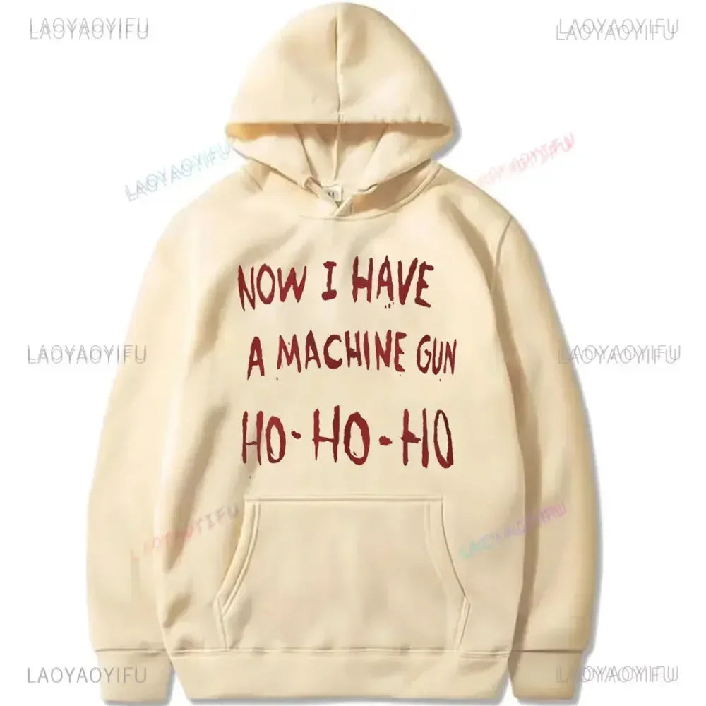 Cream-colored unisex hoodie with bold red text now i have a machine gun referencing die hard mclane naktomi plaza