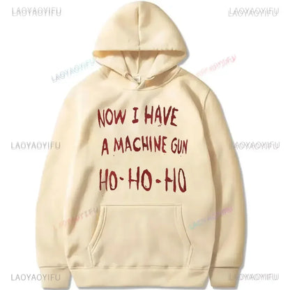 Cream-colored unisex hoodie with bold red text now i have a machine gun referencing die hard mclane naktomi plaza