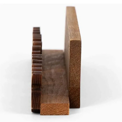 Dark brown solid wood album key rack with rustic finish and evenly spaced slots for playing vinyl record display