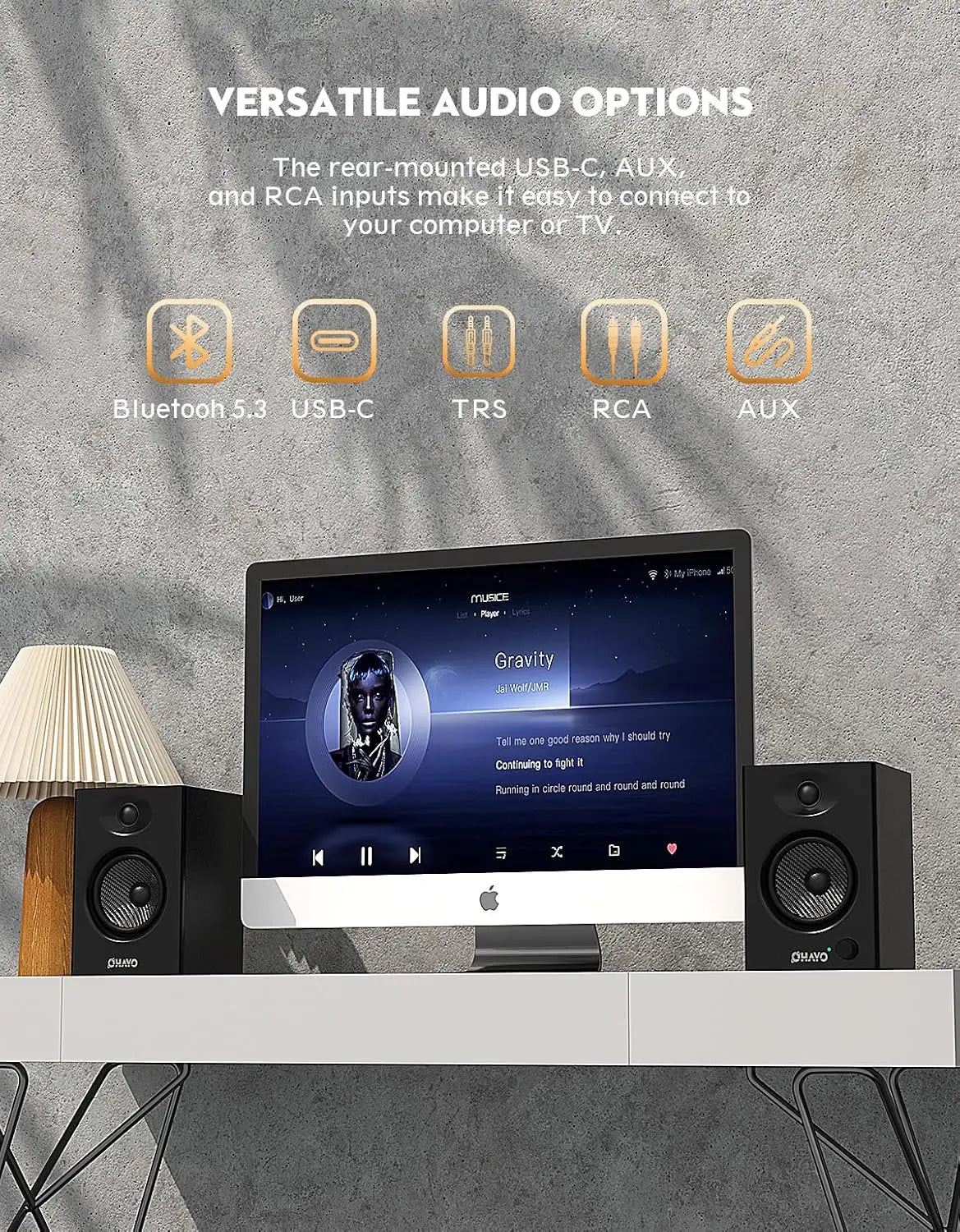 Black ohayo 60w computer speakers with active bluetooth in premium mdf wooden enclosures beside silver apple imac