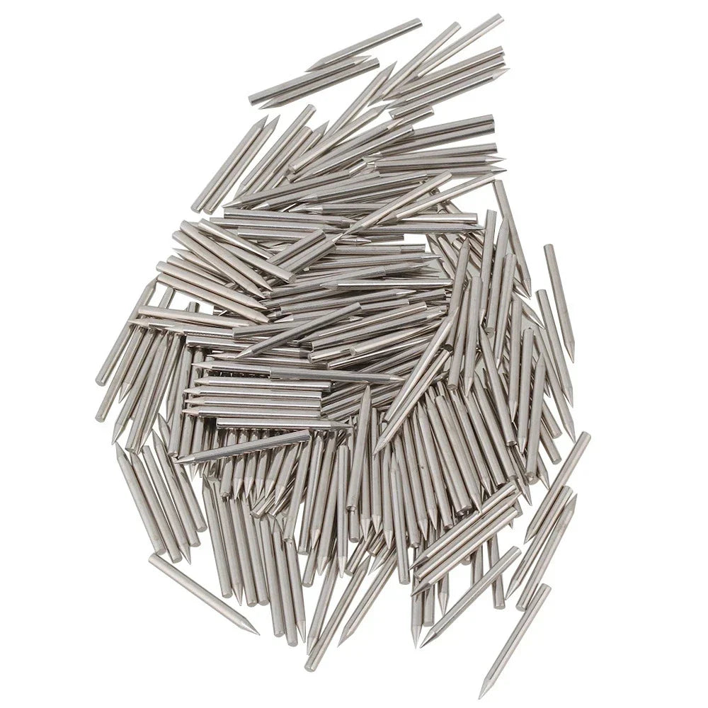A pile of silver stainless steel piano repair action center pins replacement with pointed metallic finish