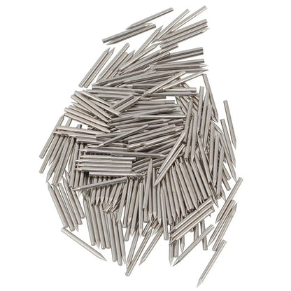 A pile of silver stainless steel piano repair action center pins replacement with pointed metallic finish