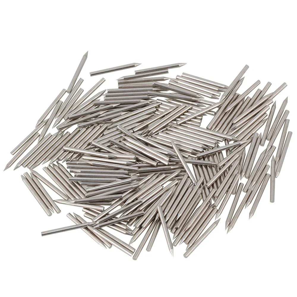 A pile of silver stainless steel piano repair action center pins replacement with slender pointed tips and cylindrical shafts