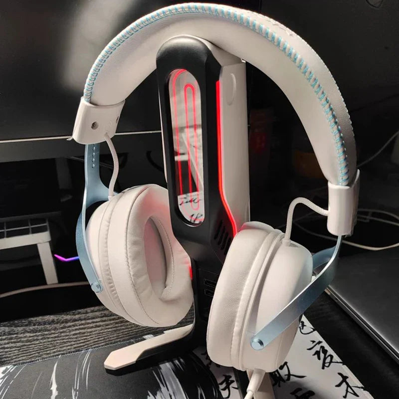 White and light blue mchose v9 pro pro customized gaming headset with padded earcups on a black stand with red led lighting