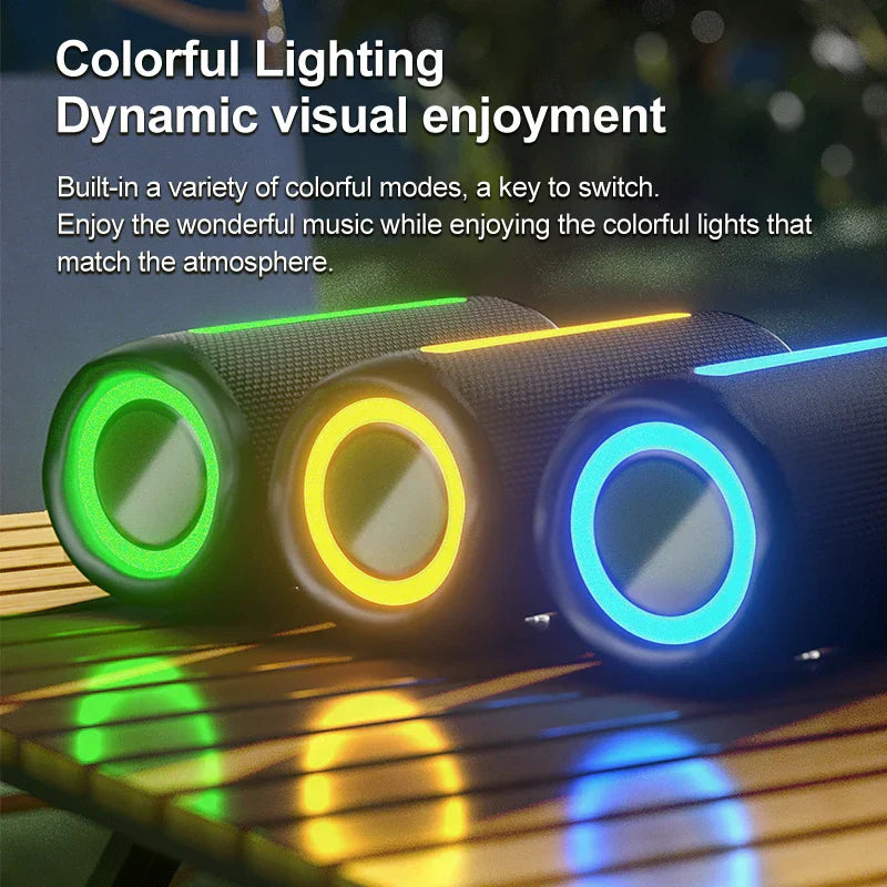 Three black cylindrical portable ebs-613 speakers with colorful led light and super bass wireless bluetooth functionality