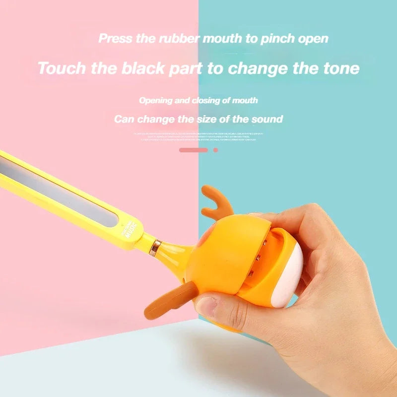 Yellow rubber duck-shaped otamatone electronic musical synthesizer toy with tone change feature for kids beginners gift