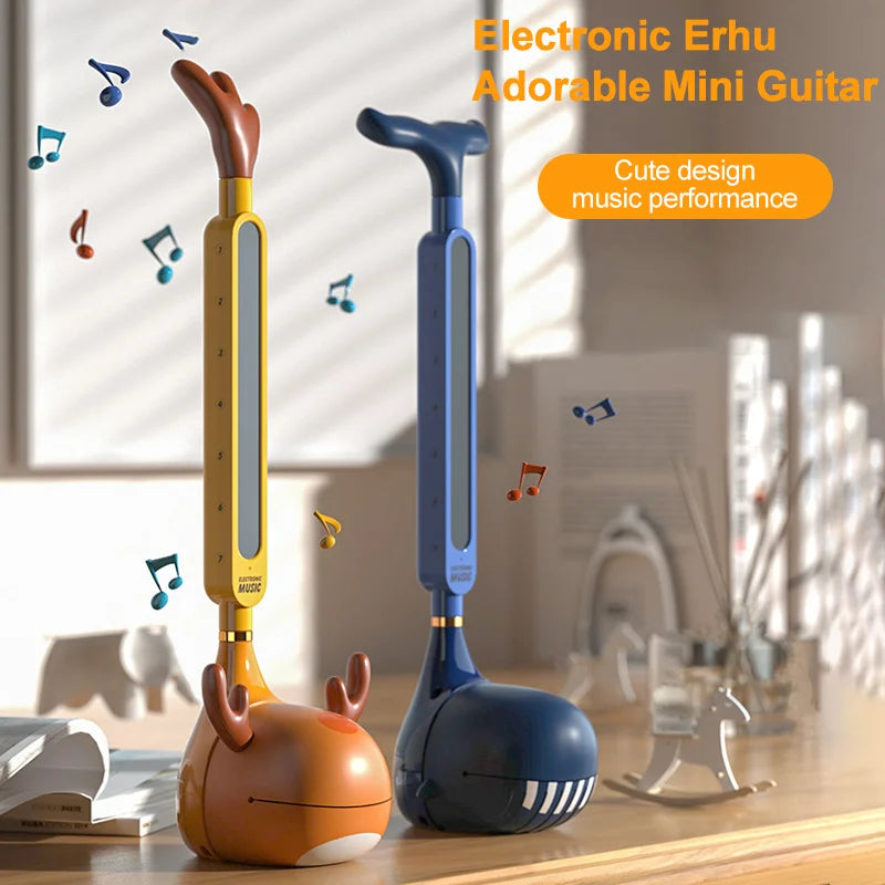 Cute otamatone Japanese electronic mini guitars in yellow and blue plastic with deer and whale designs for educational use