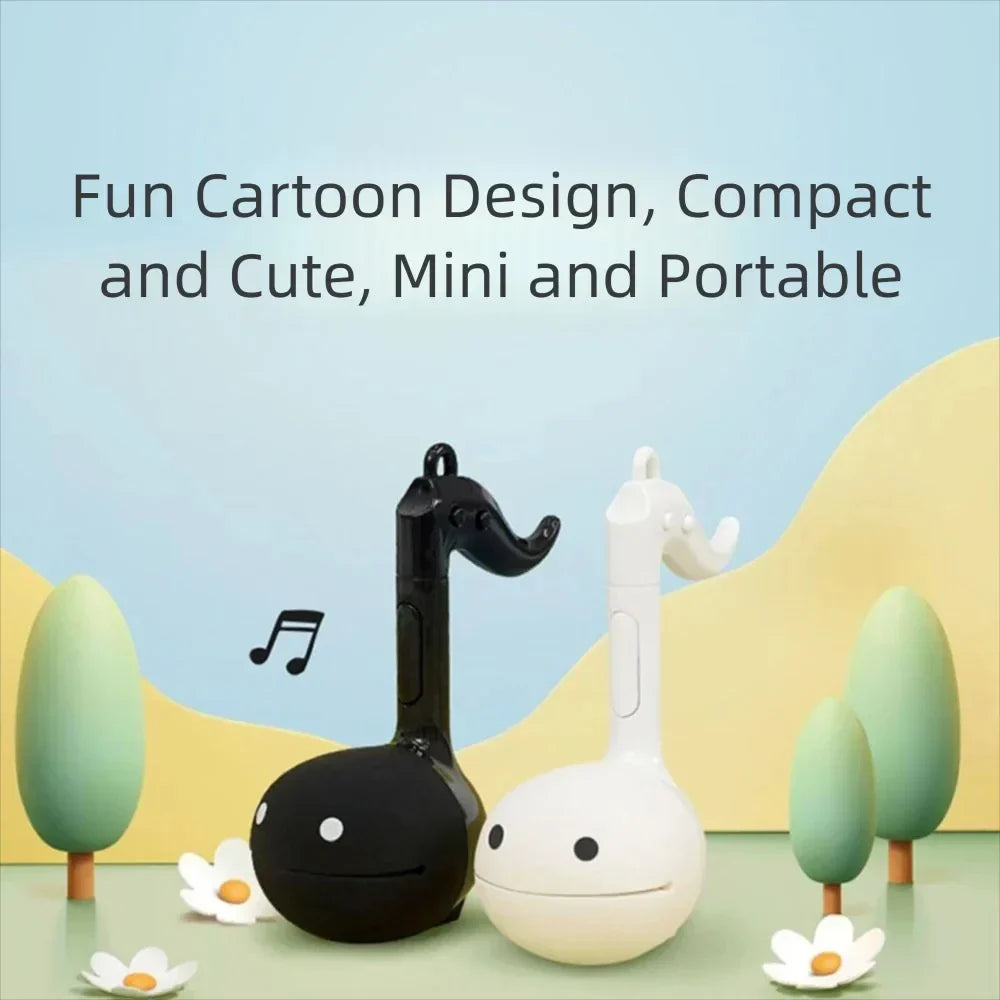 Black and white otamatone mini electronic musical toys soothing relaxing musical instruments shaped like notes