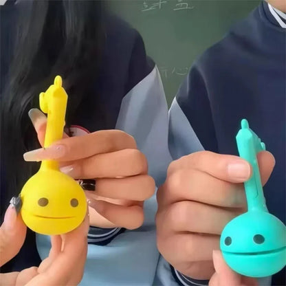 Yellow and teal silicone otamatone mini electronic keychain stress relievers with smiling faces for relaxing musical instruments