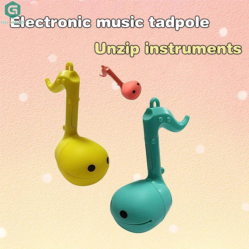 Yellow and teal otamatone mini electronic musical toys with cute cartoon faces for soothing and relaxing musical instruments