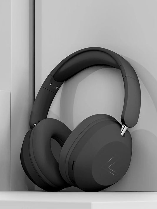 Black over-ear bluetooth headphones with wireless calls high-quality sound and sleek minimalist design for sports gaming and music
