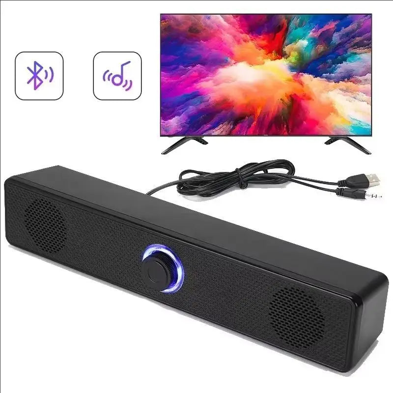 Black rectangular pc soundbar with glowing blue control knob and speaker grilles usb powered bluetooth speaker usb