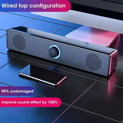 Black and silver usb powered soundbar with blue-lit control knob and perforated grilles for laptop gaming home theater surround