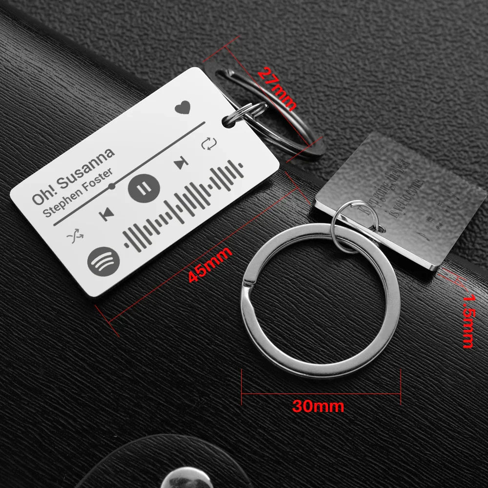Silver rectangular spotify code keychain engraved with personalized custom spotify song by stephen foster on blessings stainless steel