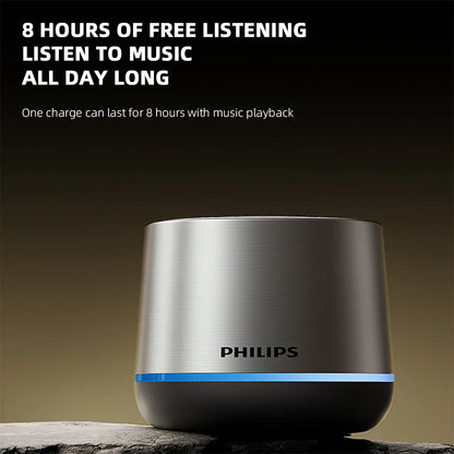 Silver brushed metal philips tas1009 portable wireless speaker with sleek cylindrical design and glowing blue led strip