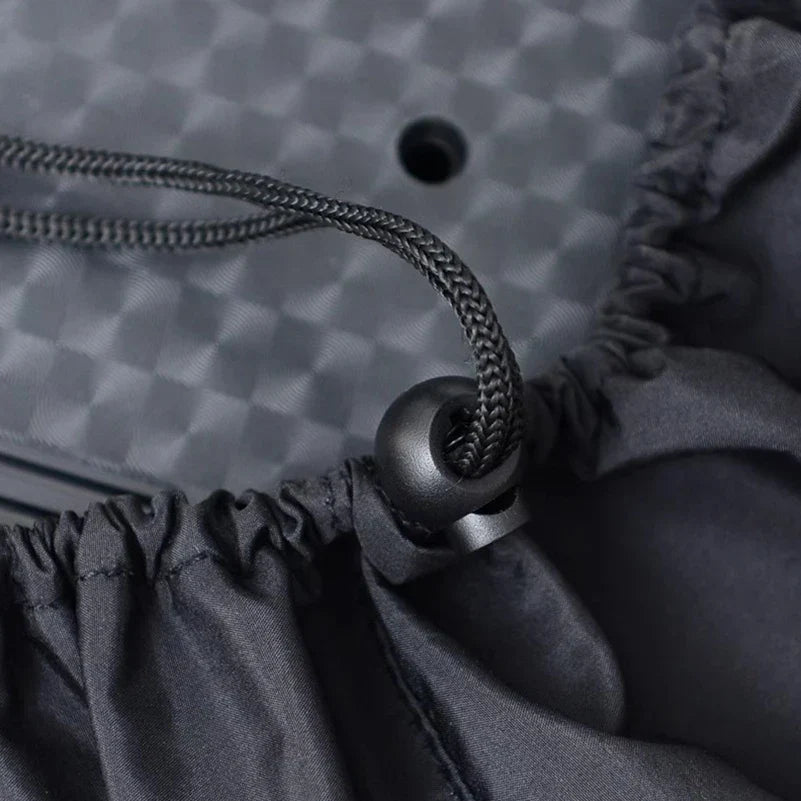Dark gray braided drawstring with metallic silver toggle on piano keyboard cover for digital electric pianos protector