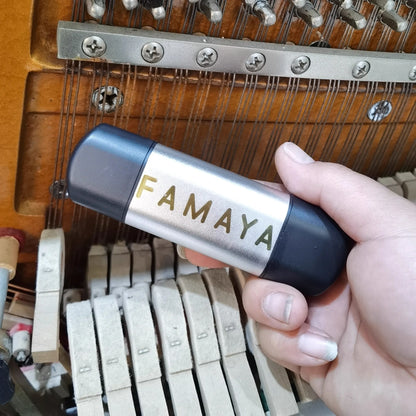 A sleek black and silver famaya piano tuning hammer with matte finish for piano string rust and string rust removal