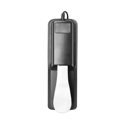 Black plastic roland electronic piano sustain damper pedal with white teardrop footrest and attached cord for keyboard use